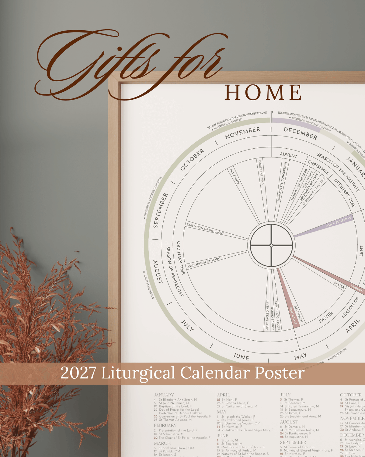 A framed 2027 Liturgical Calendar Poster titled 'Gifts for Home' shown against a muted gray wall with dried brown grass on the left. The poster features a large circular calendar wheel with monthly liturgical dates and text.